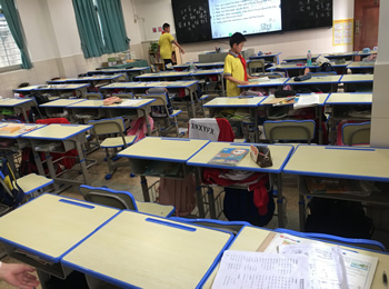Steel and wood student desks and chairs